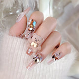 24Pcs Pink Glossy Medium Almond Fake Nails Press on Glitter Shining Heart with Rhinestone Pearl Deisgn False Nails Tips Stick LANFUBEISI