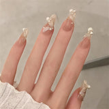 24Ps/Set Medium Long French Fake Nails Bow Japan Nude Pink with Pearls Artificial Acrylic Press on Nails Removable Stick on Nail LANFUBEISI