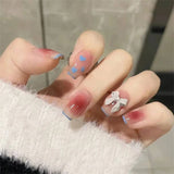 24Ps/Set Medium Long French Fake Nails Bow Japan Nude Pink with Pearls Artificial Acrylic Press on Nails Removable Stick on Nail LANFUBEISI